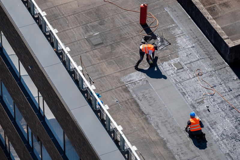Why Do Commercial Buildings Have Flat Roofs