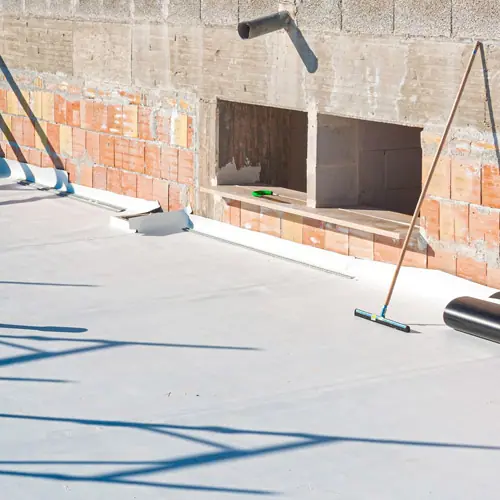White TPO membrane on a flat roof, one of the roof types LOA installs in Austin